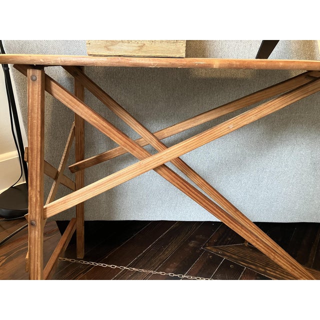 This vintage wooden miniature ironing board has transformed beautifully from a child’s plaything into a one‑of‑a‑kind...