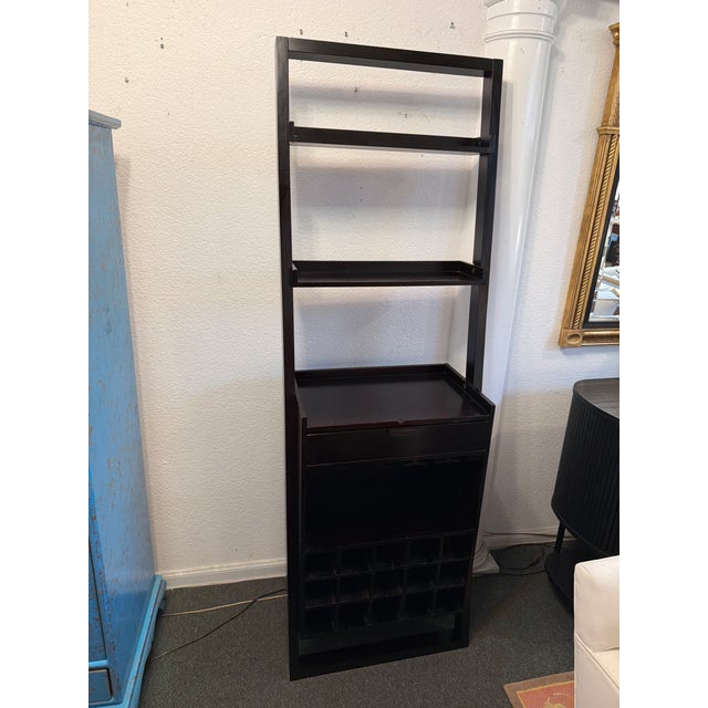 Design Plus Gallery presents the Sloane Wine Bar from Crate & Barrel. Modern, sleek and clean in expresso dark wood....