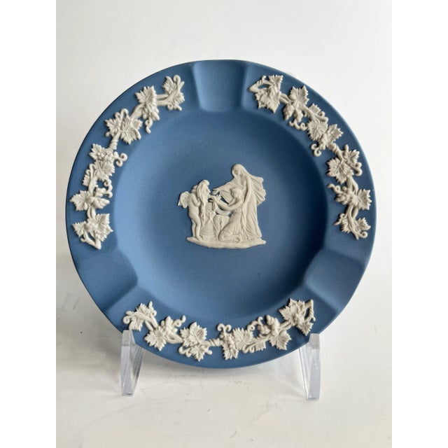 Vintage Wedgwood Blue Jasperware Ashtray or Catchall Dish. Stamped "Wedgwood Made in England". Matte light blue base layer...