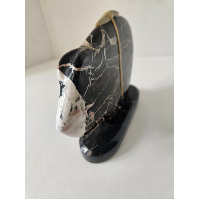 This is an authentic Zuni style medicine bear fetish sculpture that was hand carved by artisan Tom Hayes. It is...