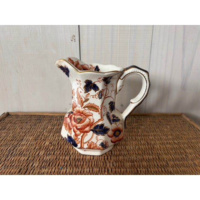 Vintage Enoch pitcher from Wedgwood! This heavy old piece of pottery from the iconic English maker is adorned with orange...