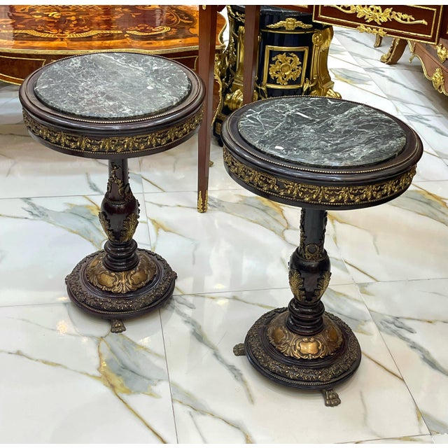 Bring timeless French elegance into your home with this exquisite Louis XVI-inspired round side table. Crafted from...