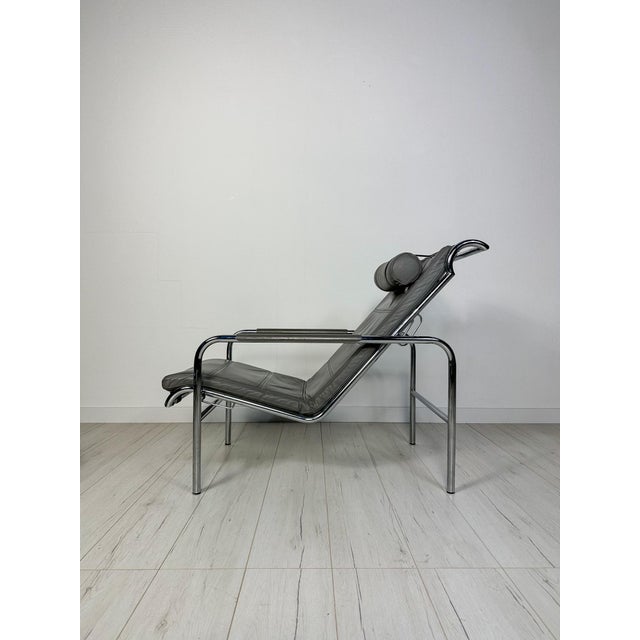 Beautiful vintage ‘genni’ lounge chair with matching ottoman designed by gabriele mucchi for zanotta. Originally conceived...