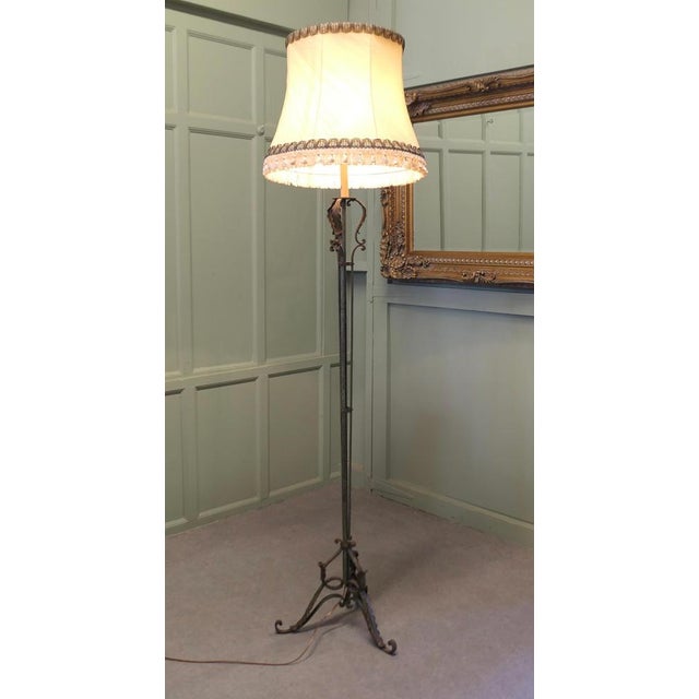 Decorative Wrought Iron Floor Lamp This is a very tall piece, the lamp has a decorative wrought Iron base which is still...