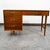 Refinished BP John desk in walnut. Very nice construction, great details. Comes with 4 drawers with metal handles. Unique...