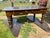 This Vintage Rustic Farmhouse Dining Table with Two Benches is an authentic antique piece from the 1920-1949 time period,...