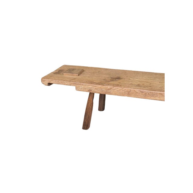 Handcrafted from reclaimed teak wood, this sculptural bench celebrates the quiet beauty of organic materials and...