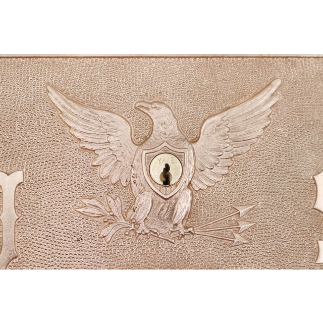 Vintage U.S. Post Office PO box door, a popular collectible often dating from the early to mid 20th century. It is made of...