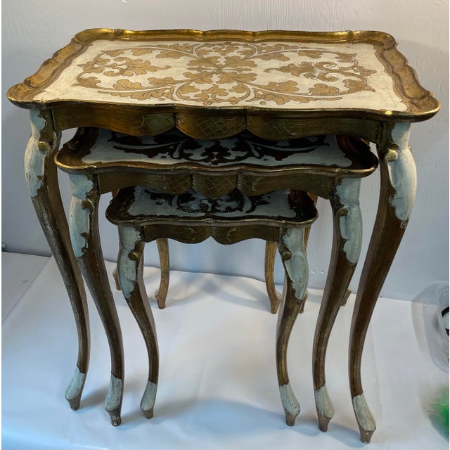 Love this pretty set of vintage Italian gilt wood nesting tables!