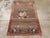 This mid-20th century Turkish Anatolian rug, measuring 3' 4" x 5' 1", showcases a striking minimalist composition rooted...