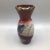 Hand thrown pottery vases. One is just a bit smaller than the other. The Small one measures 2.75 inches wide by 6.25...