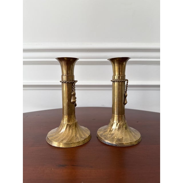 This pair of solid brass candle holders with their rope and tassel design is for anyone who appreciates not only patina,...