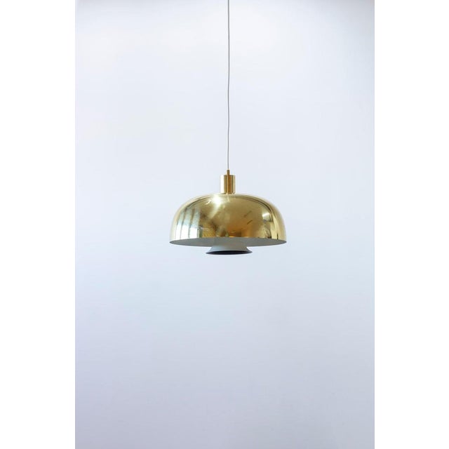 Ceiling pendant lamp designed Hans-Agne Jakobsson. Manufactured by his own company in Markaryd, Sweden during the 1960s....