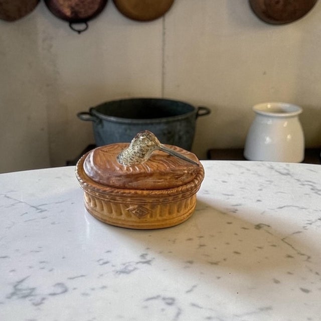 A refined vintage French porcelain terrine by Pullivuyt of Limoges, produced for Lamalle, New York City. This petite oval...