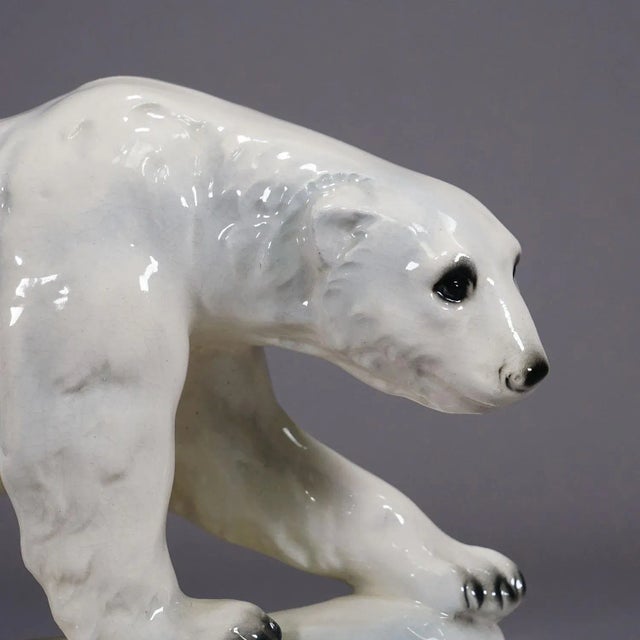 Antique Faience Polar Bear Sculpture, ca. 1930s Antique faience statue depicting a polar bear, decorated with polish...