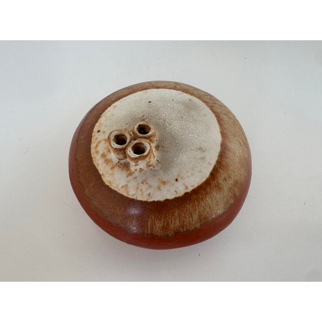 Striking mid-century studio art pottery vase by Warren Hullow, created during his time at Isabel Park. This sculptural...