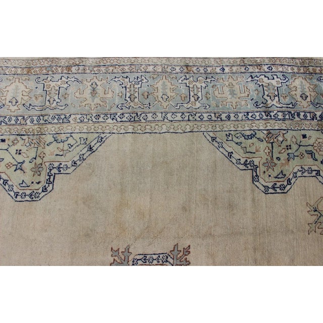 Textile Early 20th Century Antique Turkish Oushak With Geometric Motifs in Champagne Field and Accent Blue For Sale - Image 7 of 12