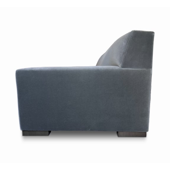 This Luca sofa pairs a minimal, modern silhouette with wide, sloped arms, an unfussy tight back and deep cushions that...