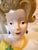Fun mid-century retro head vase from the 1970's. The piece is made of ceramic in the shape of a lady bust with sculpted...