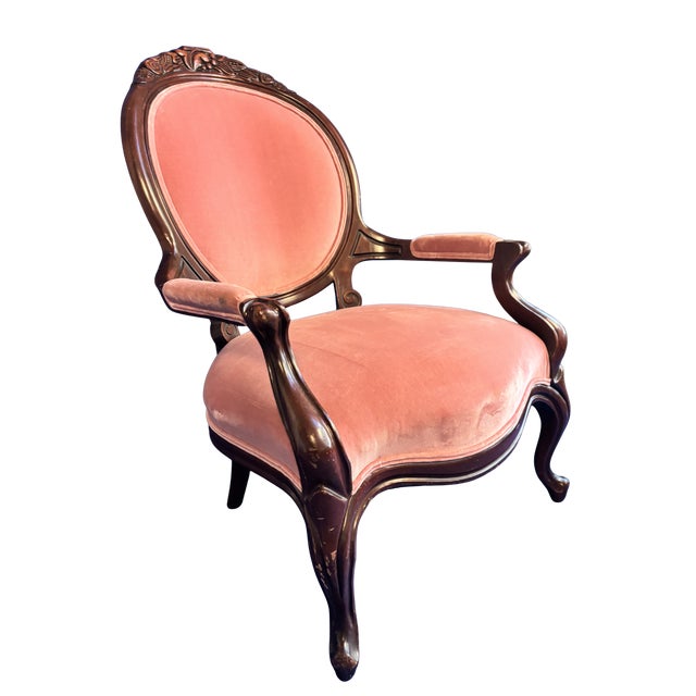 This exquisite mid-19th-century armchair is a premier example of Rococo Revival craftsmanship. The chair features a...