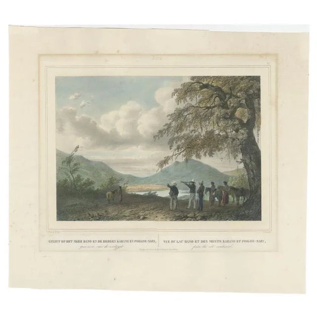 Antique print titled 'Gezigt op het meer Dano en de Bergen Karang en Poeloe-Sari - Vue du lac Dano et des monts Karang et...