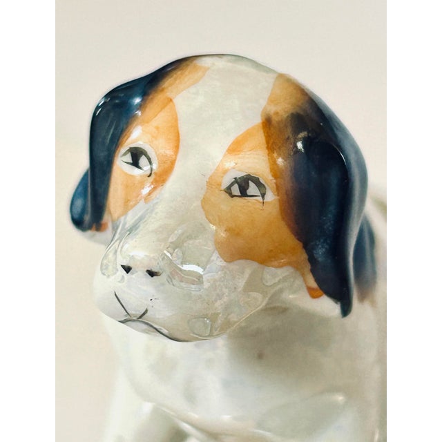 Adorable catchall in Japanese lusterware with a Jack Russell companion sitting atop. Also can be used for a place for your...