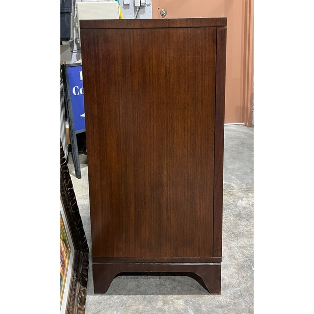 Century Furniture's Paragon Club Door Chest is an art deco style storage piece rooted in elegance. The cut out arabesque...