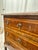 Stunning Antique Petite commode with variegated pink rectangular marble top, canted corners above a conforming case, three...