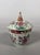 A Chinese porcelain bouillon pot with Famille Rose enamels, East India Company, 18th century. Decorated with floral...
