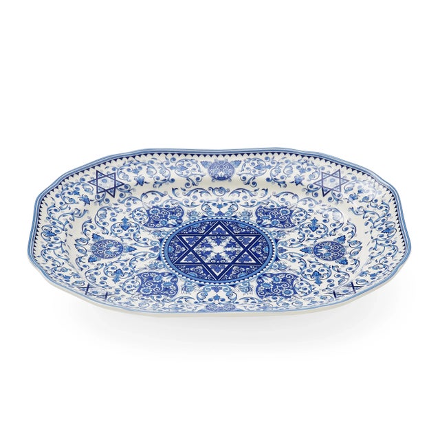 This Oval Platter from the Judaica collection is an elegantly designed serving tray featuring a design based on historic...