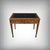 A small, flat English-style desk in mahogany and mahogany veneer, offering a striking presence thanks to the warmth of its...