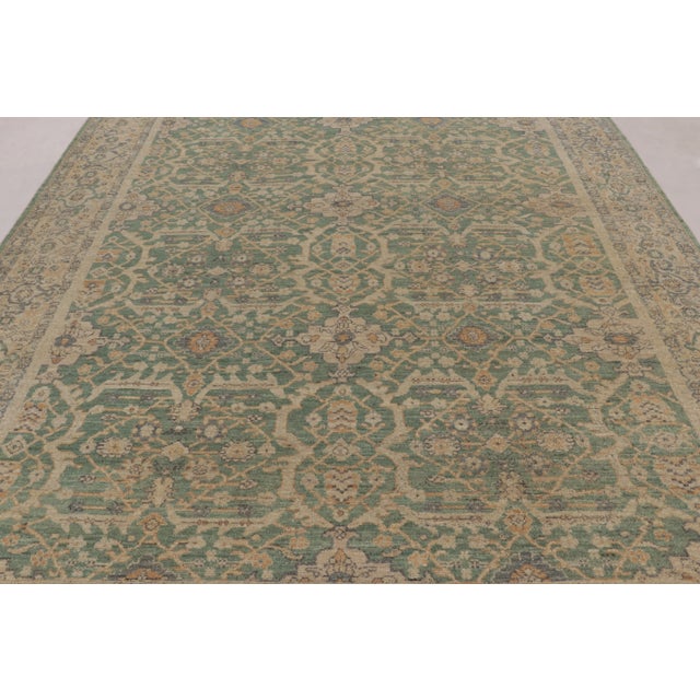This 9x12 contemporary floral Oushak rug is a refined addition to Rug & Kilim’s Modern Classics collection. Hand-knotted...