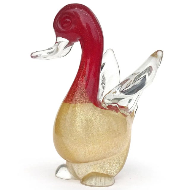 Beautiful vintage Murano hand blown Sommerso red, and gold flecks Italian art glass baby bird figurine. Attributed to the...