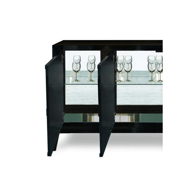 This four-door sideboard (180 - 210cm wide), is beautifully crafted by the finest Italian artisans and is finished in a...