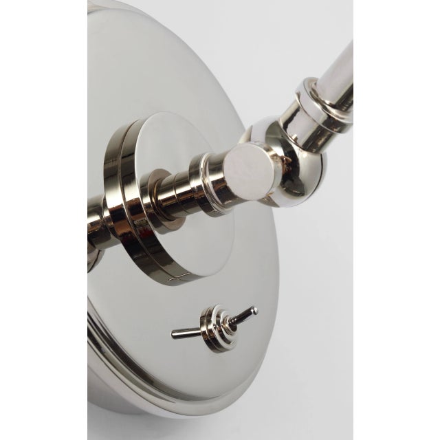 Parkington Single Library Wall Light in Polished Nickel with Clear Glass Designer: Chapman & Myers Height: 9.75" - 11.5"...