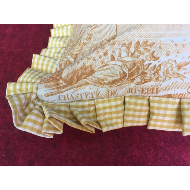A pillow made from a circa 1880’s scenic toile depicting The Chastity of Joseph. Mary Jane McCarty Collection