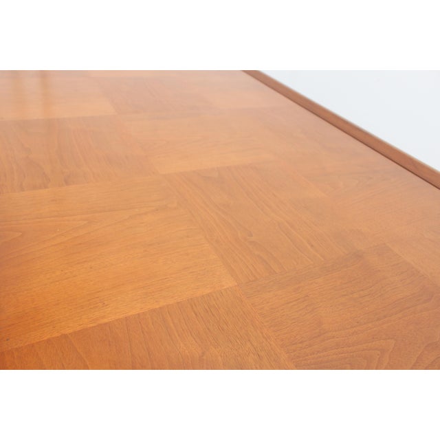 Large Drexel Parsons coffee table with muted checkerboard top and hand carved teak frame. Beautiful condition, only minor...