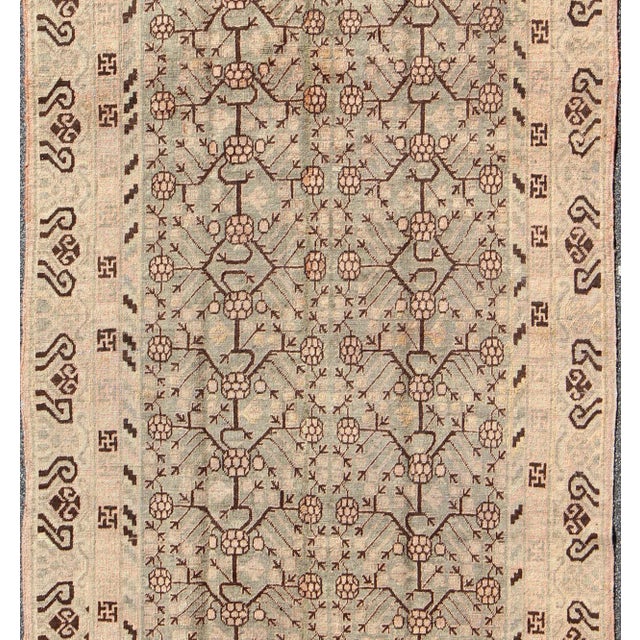 Tribal Antique Khotan Rug Featuring Repeating Lattice Motif in Soft Gray, Warm Beige 5'8 X 11 For Sale - Image 3 of 8