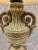 Carved urn from Florence, Italy wired as lamp with hand painted shade and antique finial, some parts gilded in silver.