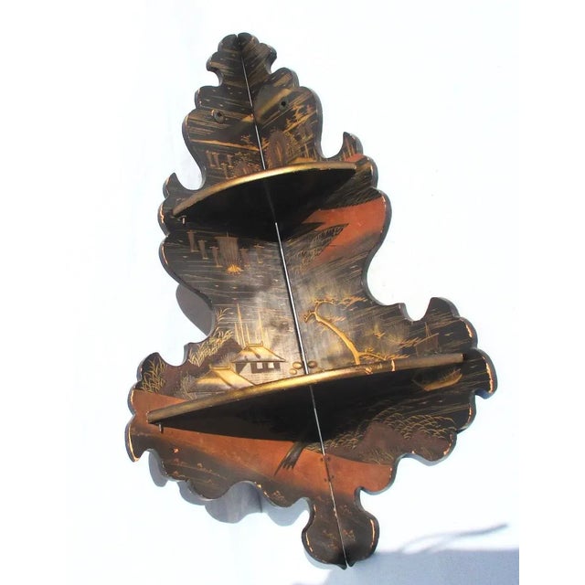 Folding corner shelf made mid 19th-century Japan. Two quarter-round small shelves that attach to one side by hinges and...