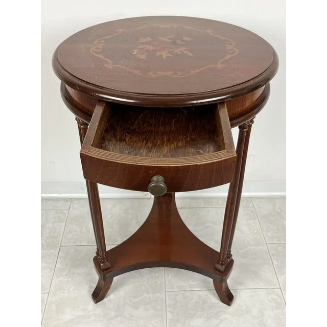 Round wooden table, with drawer, inlaid top. from slight restoration, discrete conditions. Dates back to the early 80s.