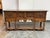Design Plus Gallery presents a 1920's Tudor Revival Carved Walnut Console Server by Empire Manufacturing Company. This...