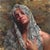 This oil painting on wood panel features a figure draped in a delicate, translucent veil, creating an intimate and...
