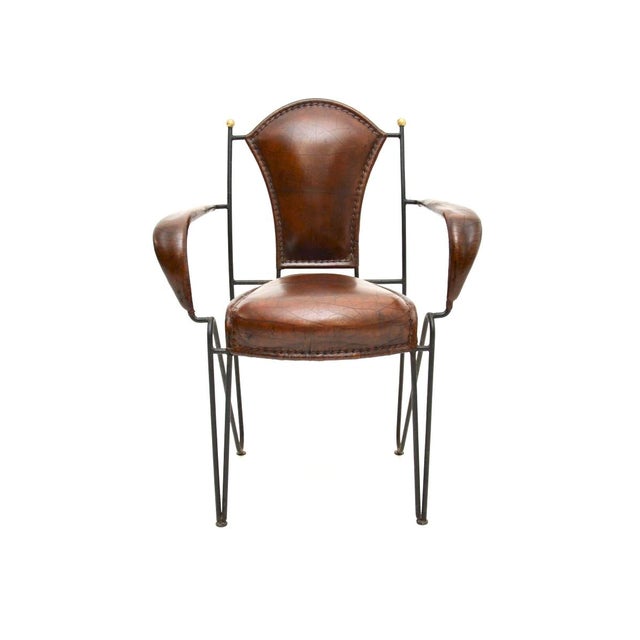 A stunning vintage French iron and leather armchair, dating from around the 1960’s. It is a great size for use as a desk...