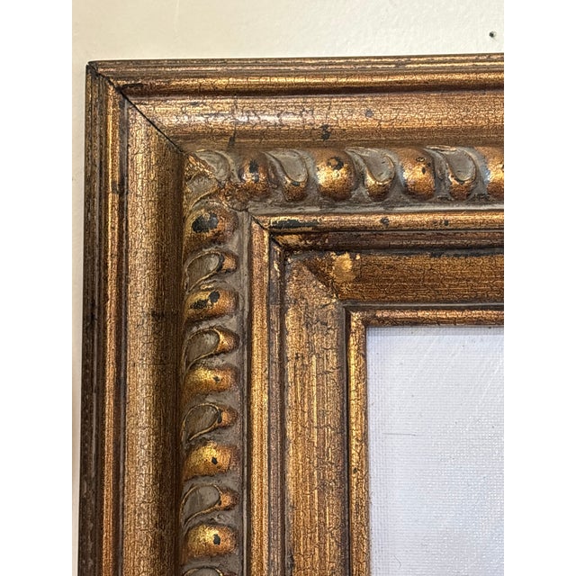 Bring the quiet beauty of winter into your home with this charming vintage signed landscape oil painting depicting a...