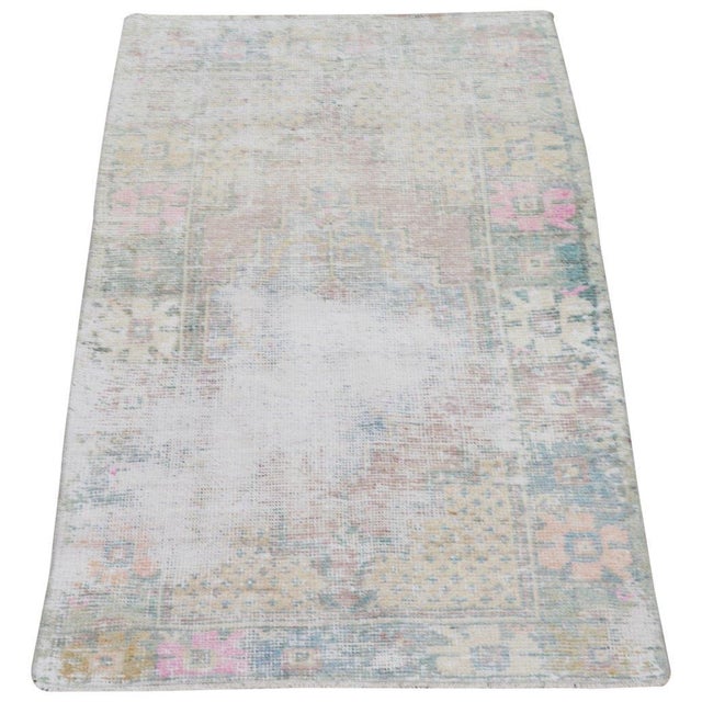 Hand-knotted with care using traditional rug-making techniques, this wool rug blends timeless craftsmanship with a modern...