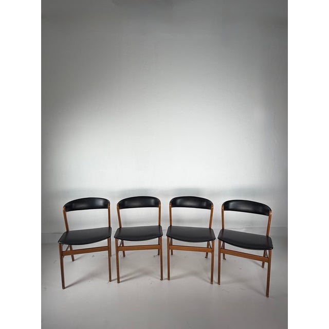 Set of four dining chairs featuring a characteristic lightweight form inspired by Scandinavian design of the 1960s. The...
