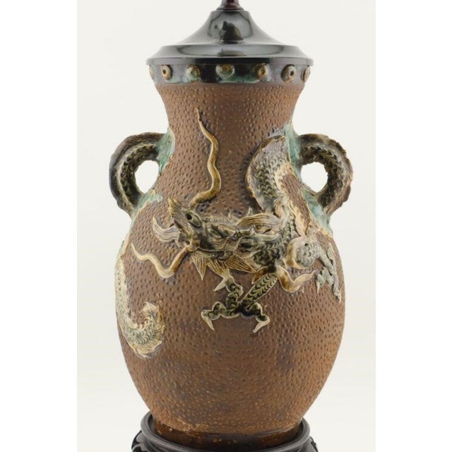 An exceptional antique Japanese Sumida Gawa (Sumidagawa) earthenware lidded vase, dating from the late Meiji to the Taisho...