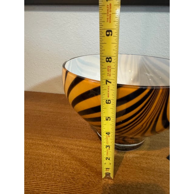 Elegant hand-blown tiger striped decorative glass bowl in the Murano style. Likely made in Poland but no origin sticker or...