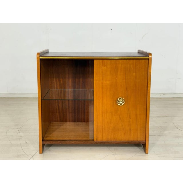 For sale is a very attractive mid-century bar cabinet in good condition. German design, 1960s. Good condition. Wood:...